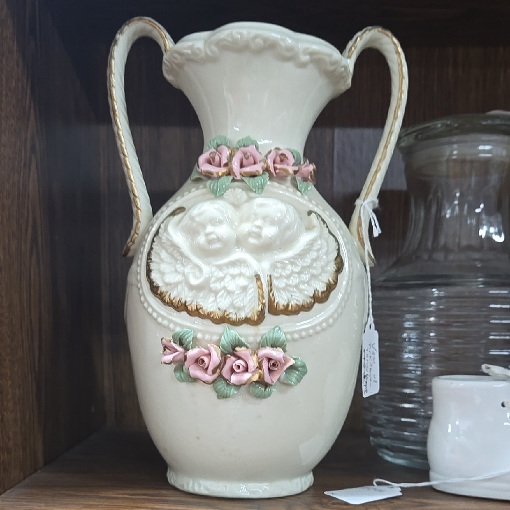 Elegant Cream Vase with Pink Floral Accents